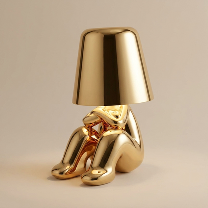AuroraGlow | Elegant Dimmable Gold Character Figurine Table Lamp 3